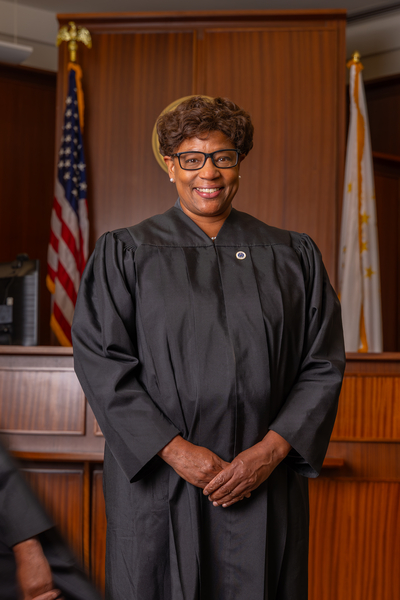 Female judge inf front of court bench