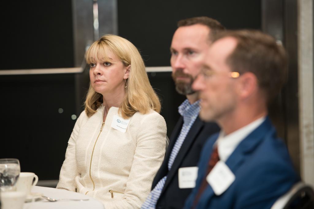 Three law alumni - one female and two males