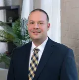 Man wearing suit and tie 
