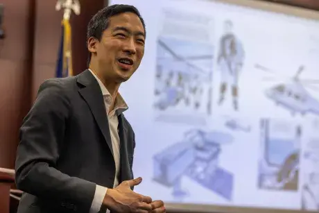 Eddie Ahn with slide in background